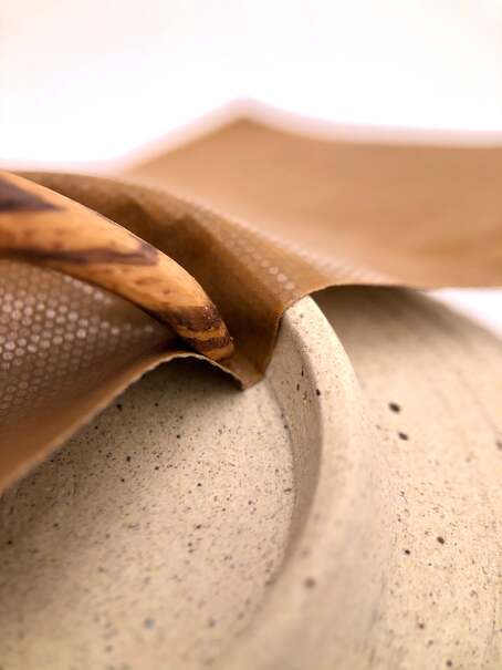 Sandpaper on pottery